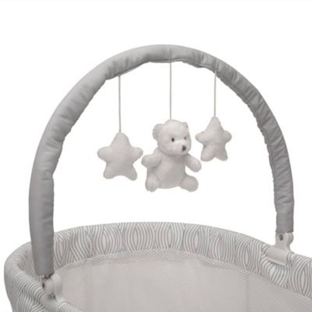 Delta Children Wave Vibrating Bassinet with Toy Bar