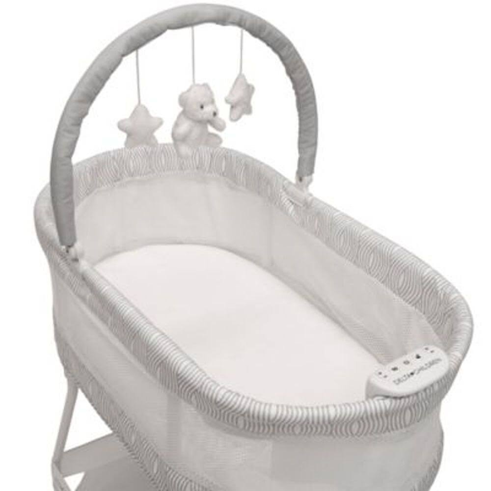 Delta Children Wave Vibrating Bassinet with Toy Bar