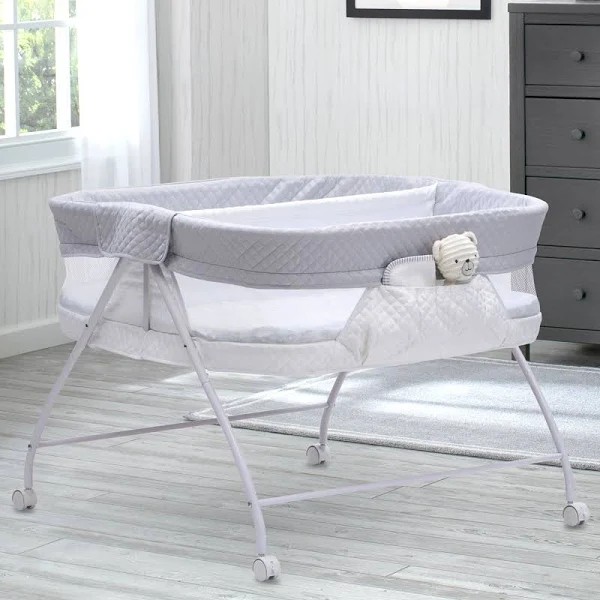 Delta Children Little Folks Twin EZ Fold Ultra Compact Double Bassinet, Aqua Geo